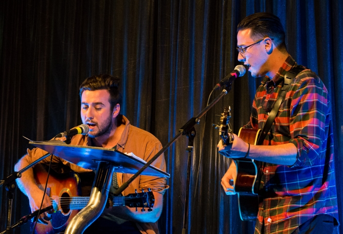 Rory and Ethan Hutchison singing and playing guitar at galah bar
